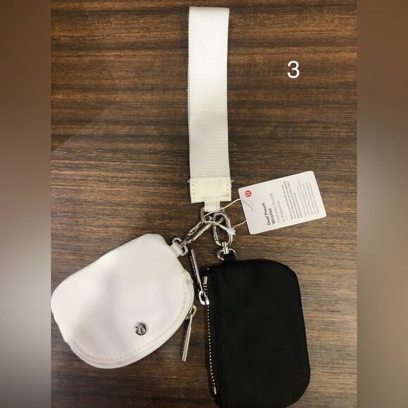Lululemon Dual Pouch Wristlet Wordmark - Picture 8 of 13